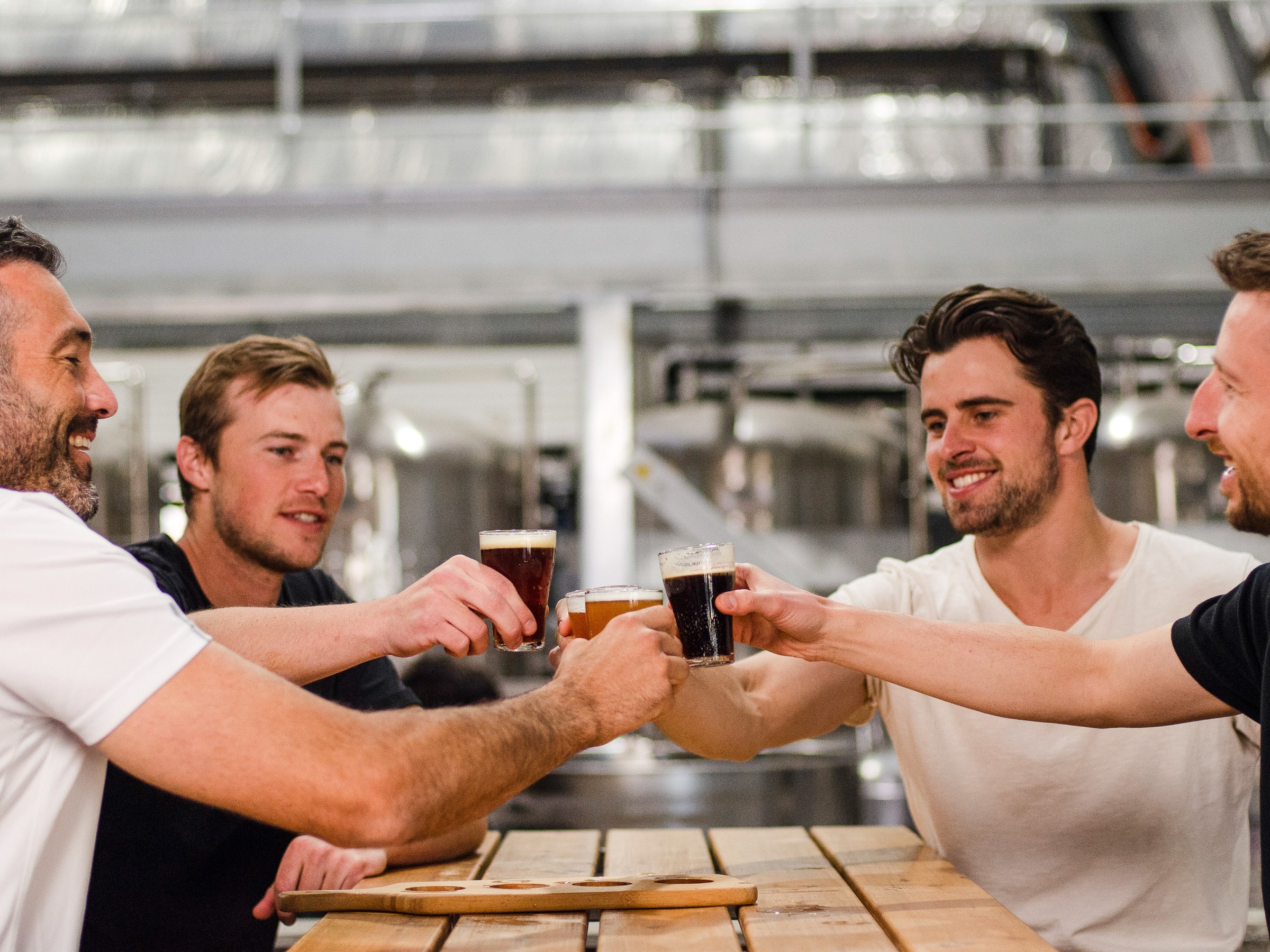 group enjoying beer at a Hunter Valley brewery